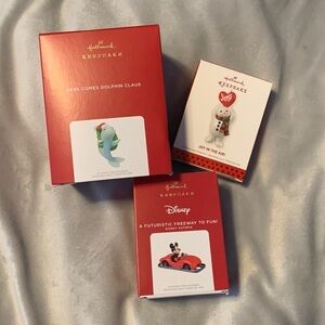 Hallmark keepsake ornaments here comes dolphin claus Disney autopia joy in air